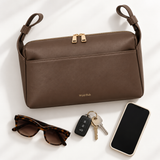 The Everyday Stroller Bag with a phone, keys and sunglasses shown alongside